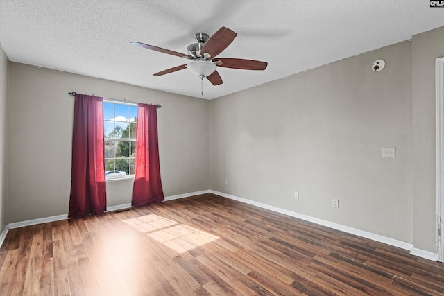 2 Berry Ridge Ct, Columbia, SC 29229 - spare room with wood finished floors, ceiling fan, baseboards, and a textured ceiling