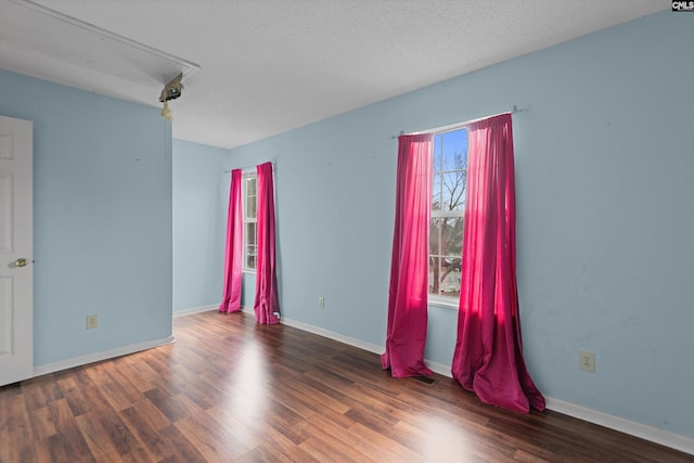 2 Berry Ridge Ct, Columbia, SC 29229 - spare room with attic access, wood finished floors, and baseboards