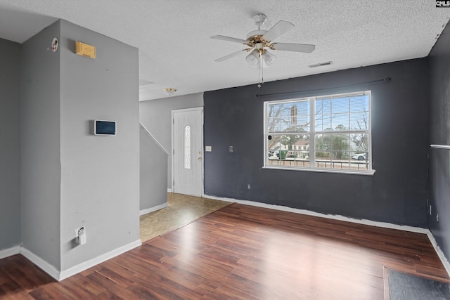 2 Berry Ridge Ct, Columbia, SC 29229 - spare room with a ceiling fan, wood finished floors, baseboards, and a textured ceiling