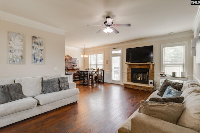 454 Henslowe Ln, West Columbia, SC 29170 - living room featuring ornamental molding, ceiling fan, healthy amount of natural light, a fireplace, and dark wood finished floors