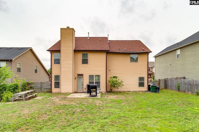 454 Henslowe Ln, West Columbia, SC 29170 - back of house with a patio and a chimney