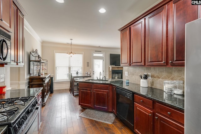 454 Henslowe Ln, West Columbia, SC 29170 - kitchen featuring black appliances, dark brown cabinets, a sink, recessed lighting, and crown molding