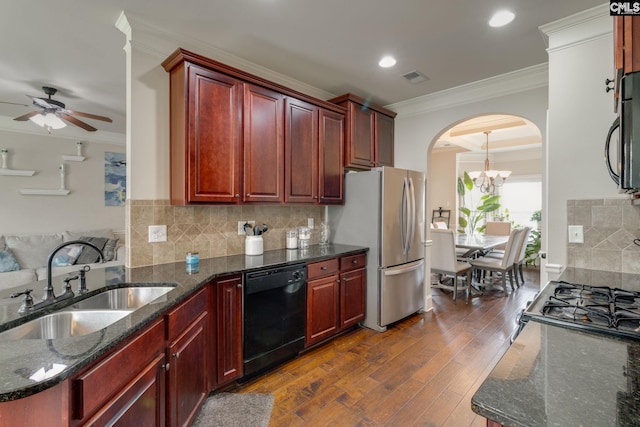454 Henslowe Ln, West Columbia, SC 29170 - kitchen with black appliances, dark brown cabinets, a sink, arched walkways, and crown molding