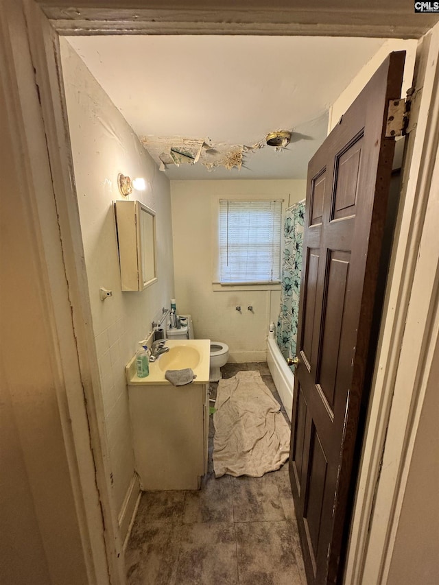 2503 Haile St, Camden, SC 29020 - full bath with vanity, toilet, and shower / bathtub combination with curtain