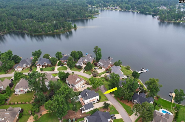 109 Quiet Cove Dr, Chapin, SC 29036 - aerial view of residential area with a nearby body of water and a heavily wooded area