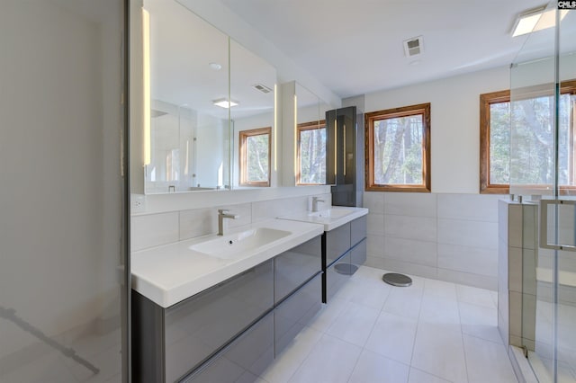 208 Gibbs Rd, Elgin, SC 29045 - full bath with tile walls, vanity, and tile patterned flooring
