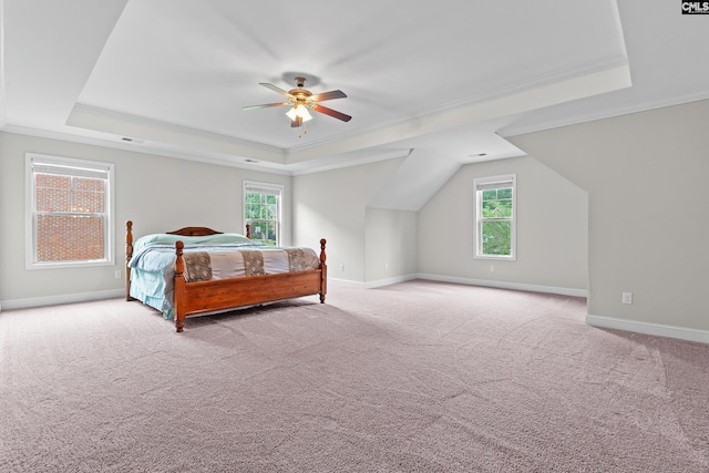 122 Lost Lure Ln, Chapin, SC 29036 - bedroom featuring a tray ceiling, carpet flooring, ornamental molding, baseboards, and multiple windows