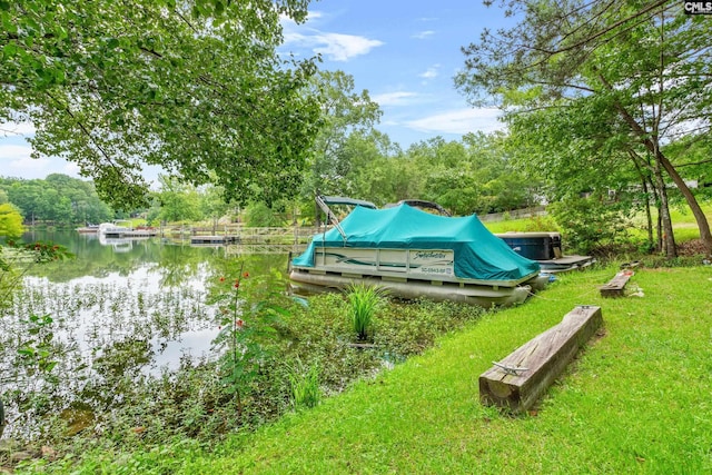 122 Lost Lure Ln, Chapin, SC 29036 - dock with a water view, a lawn, and view of wooded area