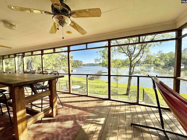 1805 Lakeshore Rd, Camden, SC 29020 - unfurnished sunroom with a water view, ornamental molding, and wood-type flooring
