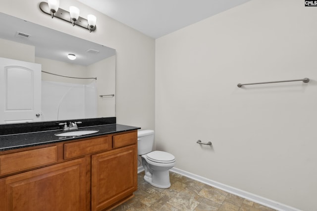 309 Tanners Mill Ct, Chapin, SC 29036 - full bathroom featuring baseboards, vanity, toilet, and a shower