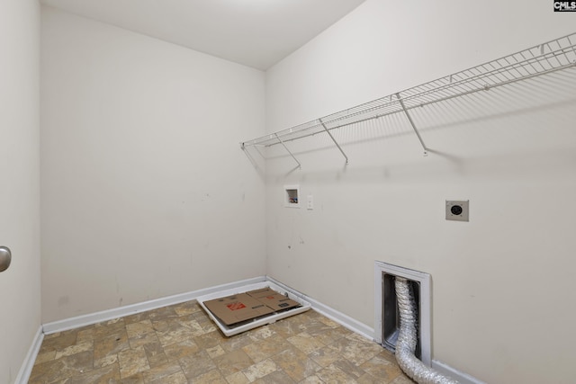 309 Tanners Mill Ct, Chapin, SC 29036 - laundry area with hookup for an electric dryer, stone finish flooring, hookup for a washing machine, and baseboards