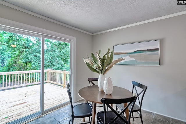 1820 Elm Abode Ter, Columbia, SC 29210 - dining space featuring a textured ceiling, crown molding, and baseboards