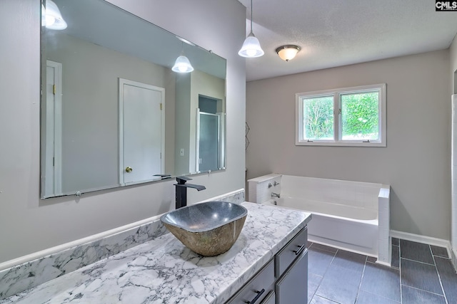 1820 Elm Abode Ter, Columbia, SC 29210 - bathroom with vanity, a bath, tile patterned floors, and baseboards