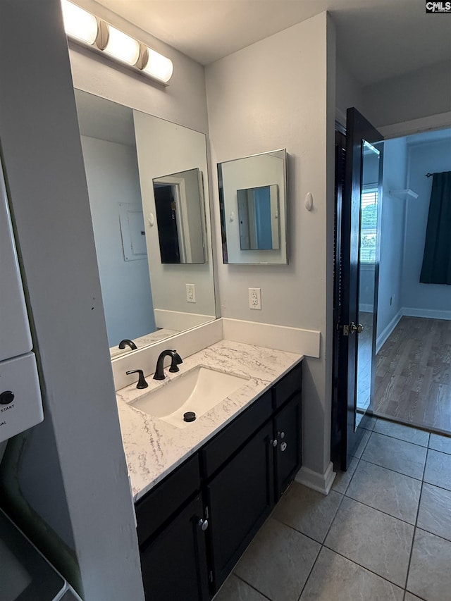 2002 Greene St Unit 113, Columbia, SC 29205 - bathroom with vanity, tile patterned floors, and baseboards