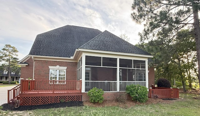 601 Cartgate Cir, Blythewood, SC 29016 - rear view of property with brick siding, roof with shingles, a sunroom, and a deck