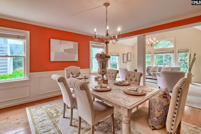 156 Whisperwood Dr, Lexington, SC 29072 - dining room featuring a chandelier, wainscoting, light wood finished floors, and ornamental molding
