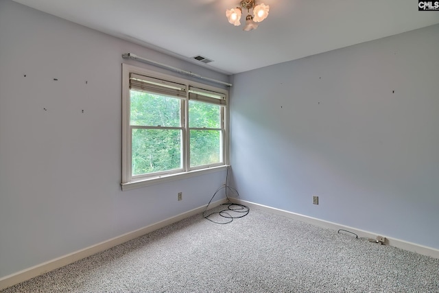 156 Whisperwood Dr, Lexington, SC 29072 - carpeted empty room with baseboards and a chandelier