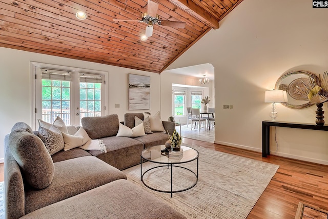 156 Whisperwood Dr, Lexington, SC 29072 - living area featuring wooden ceiling with exposed beams, ceiling fan, baseboards, light wood-style flooring, and a chandelier