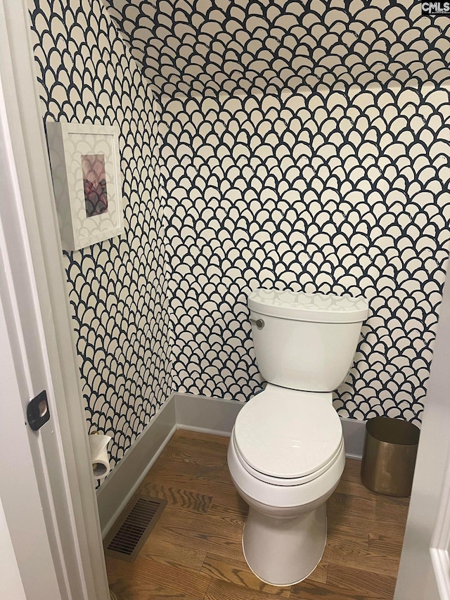 210 S Waccamaw Ave, Columbia, SC 29205 - bathroom with toilet, wood finished floors, and baseboards