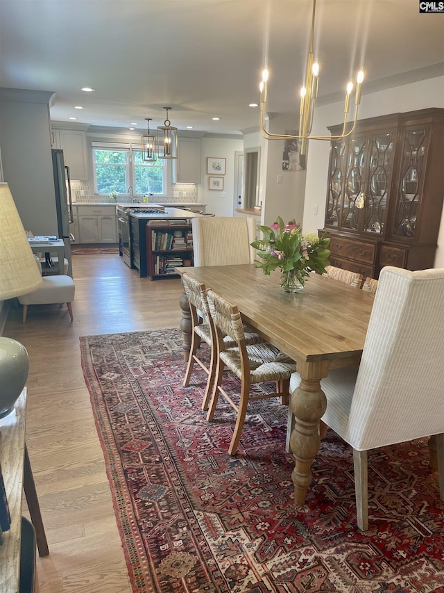 210 S Waccamaw Ave, Columbia, SC 29205 - dining room featuring a chandelier, light wood-style floors, and recessed lighting