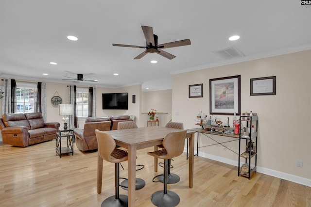 531 Sulgrave Dr, Columbia, SC 29210 - dining room featuring a ceiling fan, crown molding, light wood finished floors, recessed lighting, and baseboards