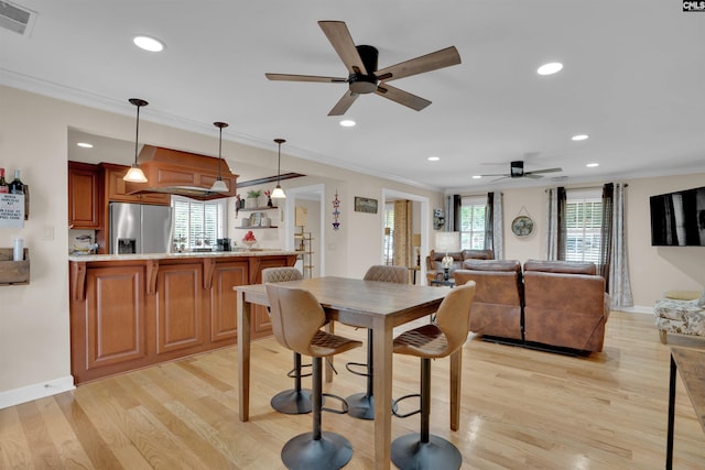 531 Sulgrave Dr, Columbia, SC 29210 - dining space featuring ceiling fan, light wood-style floors, crown molding, recessed lighting, and baseboards