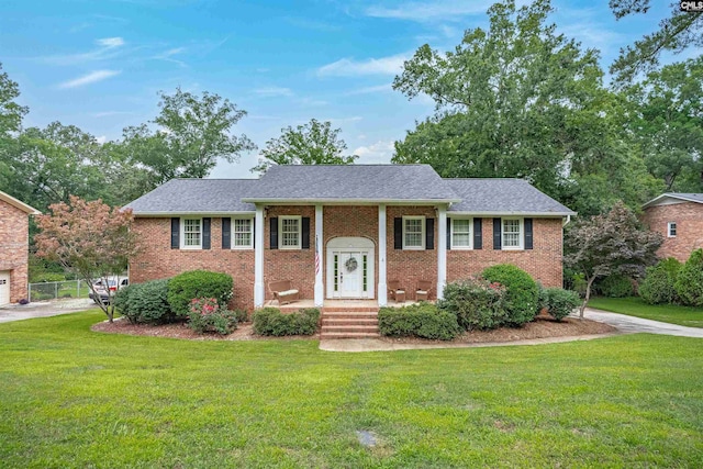 531 Sulgrave Dr, Columbia, SC 29210 - raised ranch featuring a front lawn, brick siding, and a shingled roof