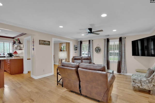 531 Sulgrave Dr, Columbia, SC 29210 - living room featuring light wood-type flooring, ornamental molding, healthy amount of natural light, a ceiling fan, and recessed lighting