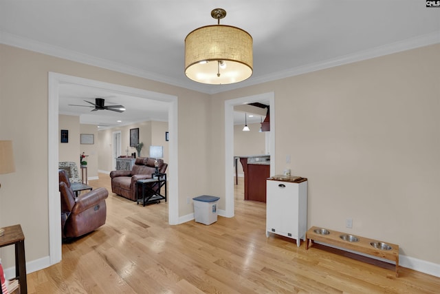 531 Sulgrave Dr, Columbia, SC 29210 - living room with light wood-style floors, a ceiling fan, ornamental molding, and baseboards