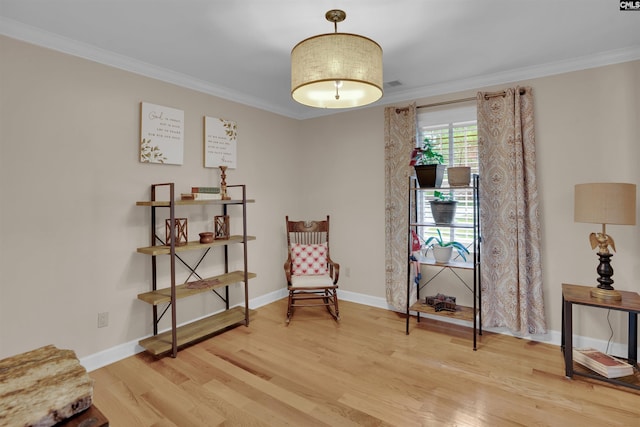 531 Sulgrave Dr, Columbia, SC 29210 - living area with wood finished floors, crown molding, and baseboards