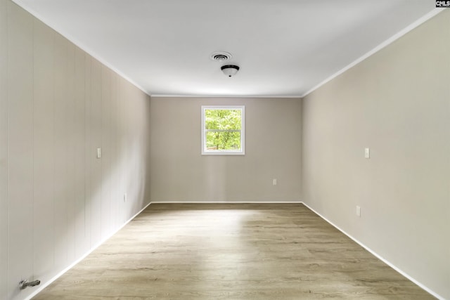 3201 Wilton Rd, West Columbia, SC 29170 - empty room featuring crown molding, wood finished floors, and baseboards
