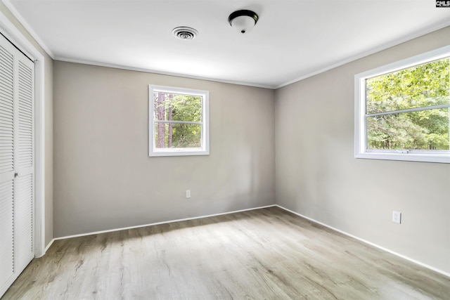 3201 Wilton Rd, West Columbia, SC 29170 - unfurnished bedroom with a closet, wood finished floors, baseboards, and ornamental molding