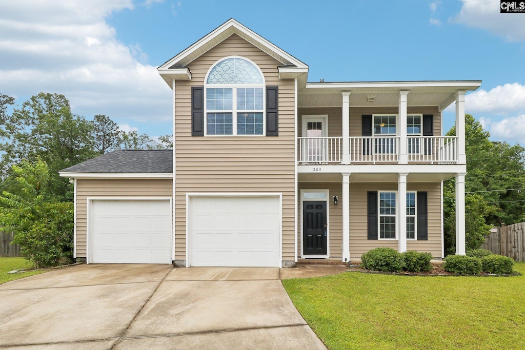 205 Birchfield Dr, Columbia, SC 29203 - view of front facade with a balcony, driveway, and a porch