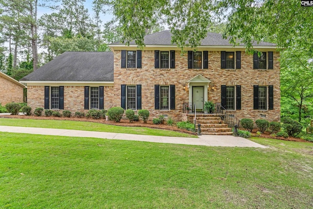117 Brookspring Rd, Columbia, SC 29223 - colonial inspired home with a front yard, brick siding, and roof with shingles