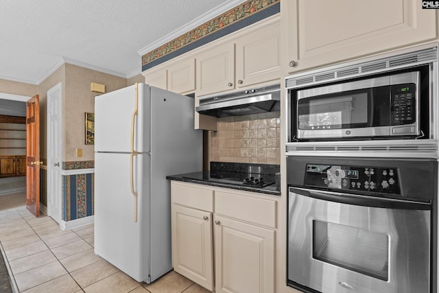 117 Brookspring Rd, Columbia, SC 29223 - kitchen featuring appliances with stainless steel finishes, under cabinet range hood, crown molding, a textured ceiling, and light tile patterned floors