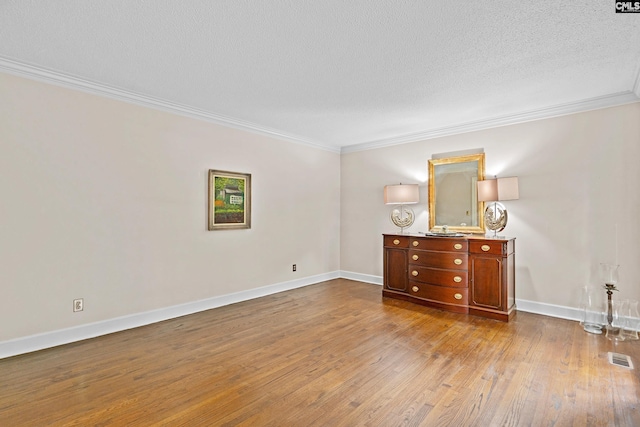 117 Brookspring Rd, Columbia, SC 29223 - unfurnished bedroom with ornamental molding, wood finished floors, baseboards, and a textured ceiling