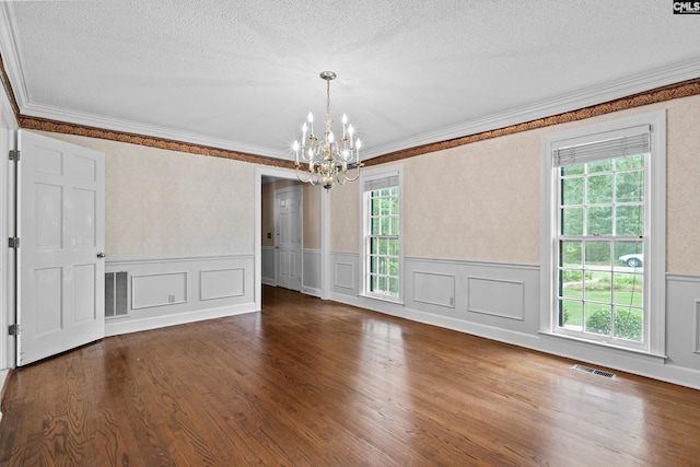 117 Brookspring Rd, Columbia, SC 29223 - unfurnished room featuring crown molding, a chandelier, wainscoting, a textured ceiling, and wood finished floors