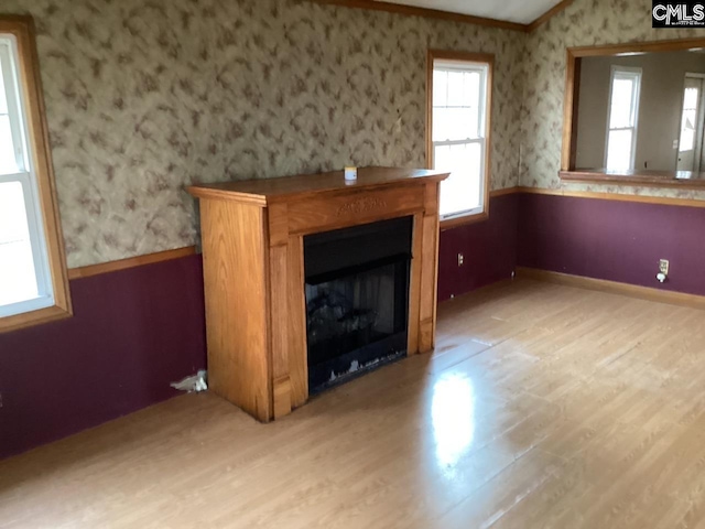 127 Dry Gulch Rd, Saluda, SC 29138 - unfurnished living room with light wood finished floors, wallpapered walls, a fireplace, vaulted ceiling, and baseboards