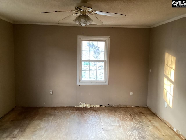 127 Dry Gulch Rd, Saluda, SC 29138 - unfurnished room with ceiling fan, crown molding, light wood-style floors, and a textured ceiling