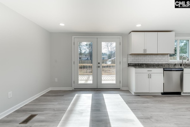 104 Big John Rd, Elgin, SC 29045 - kitchen with dishwasher, white cabinets, a sink, baseboards, and recessed lighting