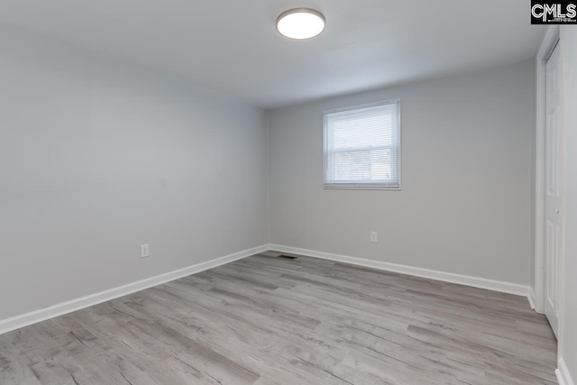 104 Big John Rd, Elgin, SC 29045 - unfurnished bedroom featuring wood finished floors, baseboards, and a closet