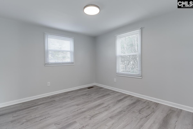 104 Big John Rd, Elgin, SC 29045 - spare room featuring wood finished floors and baseboards