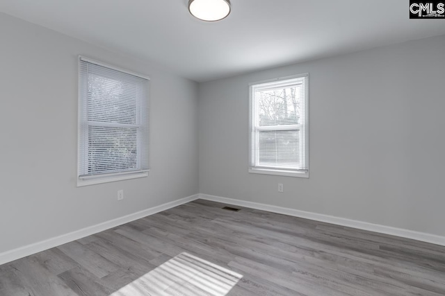 104 Big John Rd, Elgin, SC 29045 - spare room featuring wood finished floors and baseboards