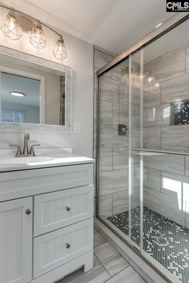 104 Big John Rd, Elgin, SC 29045 - bathroom featuring a stall shower, vanity, and marble look tiles