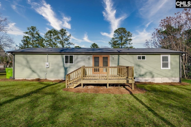 104 Big John Rd, Elgin, SC 29045 - back of house featuring a wooden deck and a lawn