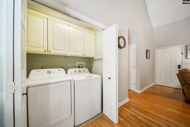 144 Stephanie Dr, Lexington, SC 29073 - washroom featuring cabinet space, washing machine and dryer, light wood-style floors, and baseboards