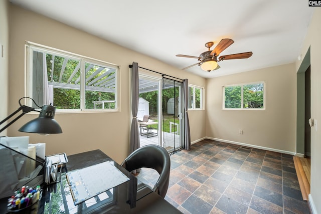 144 Stephanie Dr, Lexington, SC 29073 - home office featuring baseboards, a ceiling fan, and dark stone finish flooring