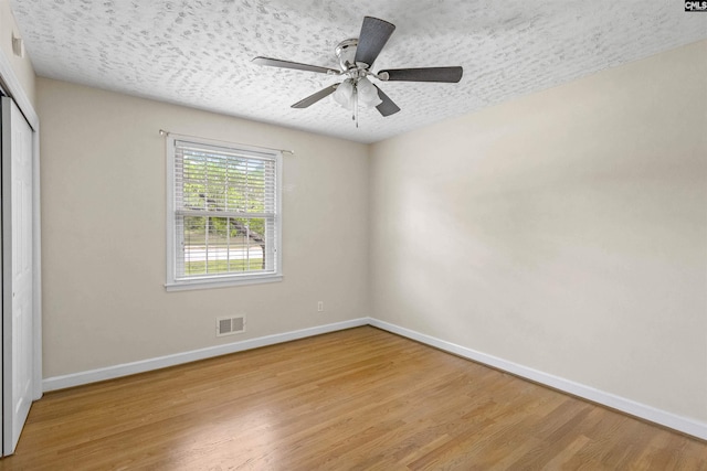 1629 B Ave, West Columbia, SC 29169 - spare room with baseboards, wood finished floors, a textured ceiling, and a ceiling fan