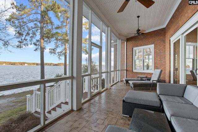 208 Ballentine Ln, Chapin, SC 29036 - sunroom / solarium featuring a water view, a ceiling fan, brick wall, and a towering ceiling