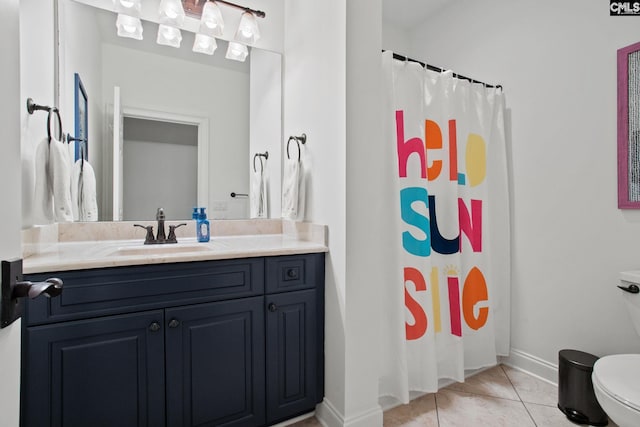 208 Ballentine Ln, Chapin, SC 29036 - bathroom featuring toilet, vanity, tile patterned flooring, baseboards, and a shower with shower curtain